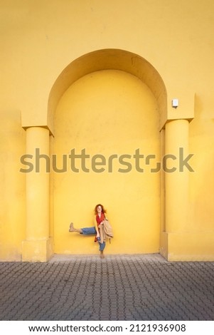 Young woman dancing and fooling around