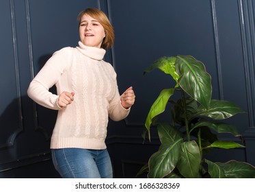 Young Woman Dancing At Home