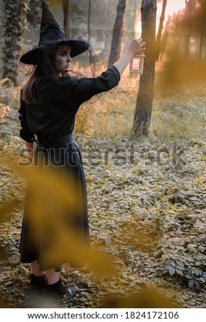 Similar – Woman with a bike in the middle of the forest.