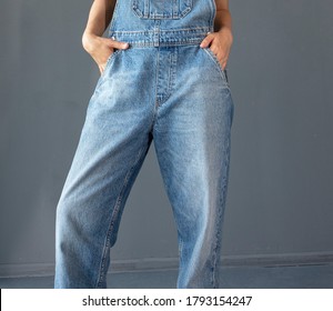 Young Woman In Denim Overalls, Studio Shooting