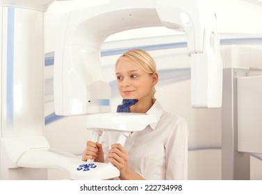 Young Woman In A Dental 3D Scanner