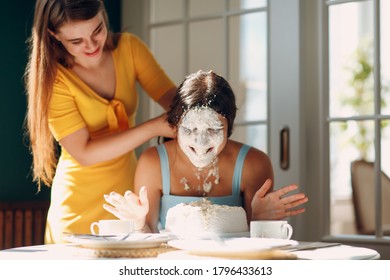 Young Woman Dips Face In White Cake With Cream. Happy Birthday Concept