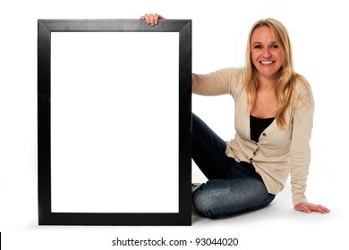 Young woman displaying a banner add isolated over a white background - Shutterstock ID 93044020