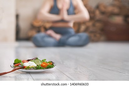 Young Woman Do Yoga. Healthy Food After A Workout. 