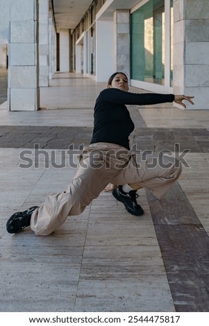 Similar – Athletic man warming up before running.