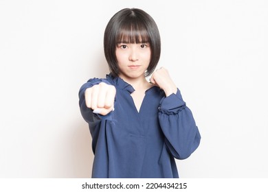 Young Woman Doing Boxing Pose