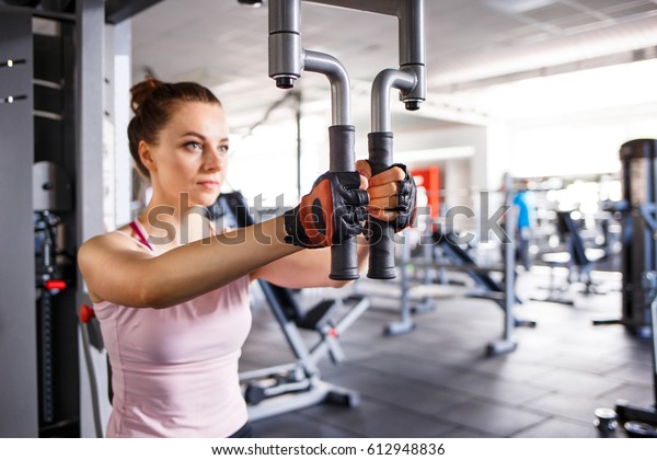 Young Woman Doing Butterfly Exercise Fitness Stock Photo 612948836 