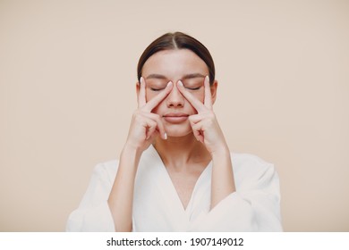 Young Woman Doing Face Building Facial Gymnastics Self Massage And Rejuvenating Exercises