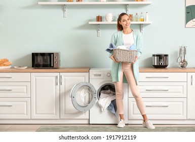 Young Woman Doing Laundry At Home