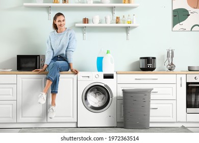 Young Woman Doing Laundry At Home