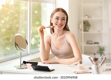 Young Woman Doing Makeup At Home