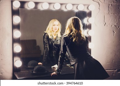  Young Woman Doing Makeup , Old-fashioned. Stands Near  Mirror. Backstage.