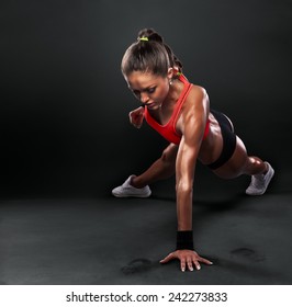 Young Woman Doing Push-Ups Workout Fitness Posture Body Building Exercise Exercising On Studio