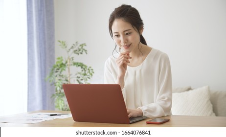 Young woman doing remote work