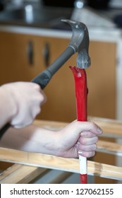 Young Woman Doing Renovation In Kitchen, Iso 800.