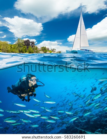 Young woman doing scuba diving and exploring coral reef. Underwater sports and tropical vacation template