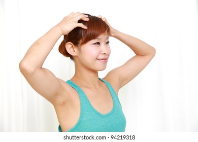 Young Woman Doing Self Head Massage