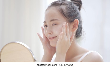 Young Woman Doing Skin Care