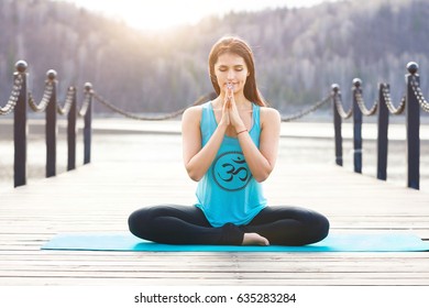 Young Woman Doing Yoga Lotus Pose Stock Photo 635283284 | Shutterstock