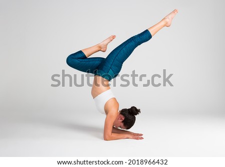 young woman doing yoga pose