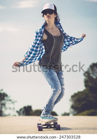 Similar – Woman walking on a fallen tree trunk