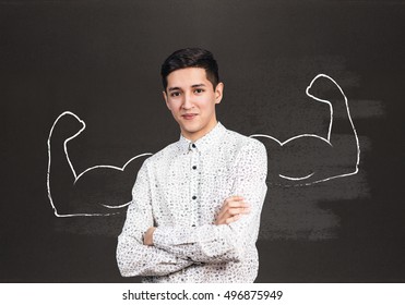 Young woman with drawn powerful hands - Shutterstock ID 496875949