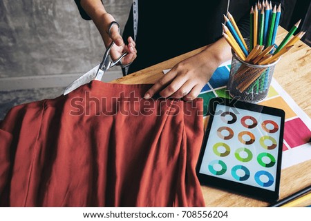 Similar – Image, Stock Photo Dressmaker cutting a cloth