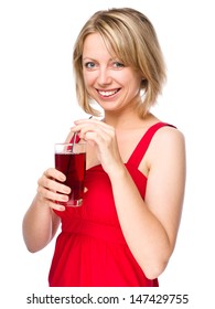 Young Woman Is Drinking Cherry Juice Using Straw, Isolated Over White