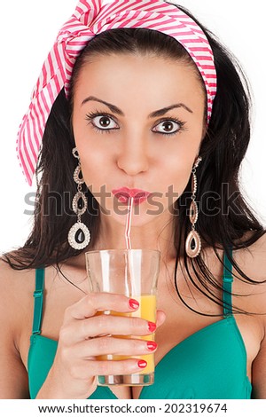  young woman drinking orange juice