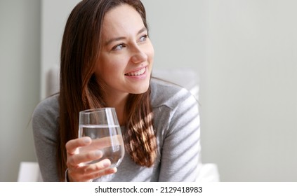 Young Woman Drinking Water Sitting On Stock Photo 2129418983 | Shutterstock