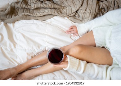 Young Woman Drinking Wine At Home In Her Bed, Top View, Flat Lay