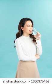 Young Woman Drinks Clean Water Adheres To Drinking Regime.