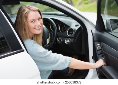 Young Woman In The Drivers Seat In Her Car