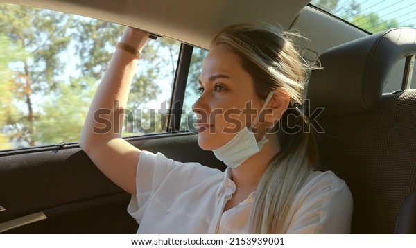 Young woman driving around and watching.Young
woman looking calmed and
peaceful.
