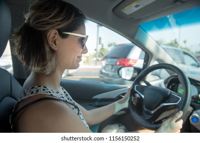 Young Woman Driving A Car 