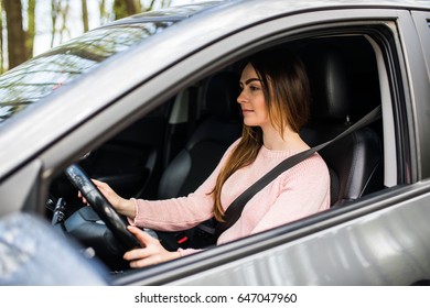 Young Woman Driving Her Car Safe Drive