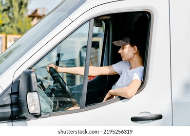 Young Woman Driving A Van