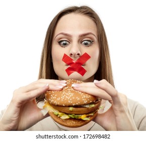 Young Woman With Duct Tape Over Her Mouth, Preventing Her To Eat Junk Food. Healthy Eating Concept