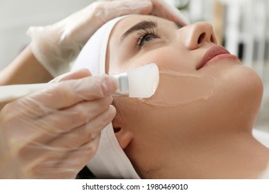 Young Woman During Face Peeling Procedure In Salon, Closeup