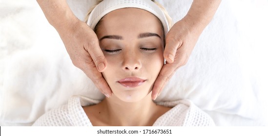 Young Woman during Spa Salon. Woman Relaxes in the spa. Spa Body massage woman Hands Treatment. woman having Thai massage in the spa salon. - Shutterstock ID 1716673651