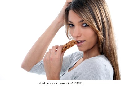 Young Woman Eating A Cereal Bar