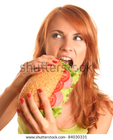 young woman eating fast food