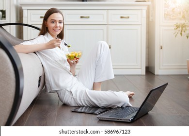 Young Woman Eating Healthy Fruit Breakfast In Bowl At Home. Healty Food. Clean Eating, Dieting, Detox, Vegetarian Food Concept.