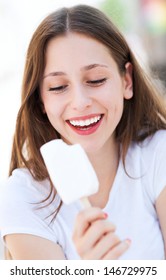 Young Woman Eating Ice Cream 