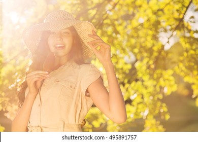 Young Woman Eating Ice Cream In The Park, Woman Eating A Popsicle In Nature