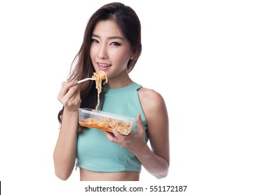 Young Woman Eating Pasta Or Spaghetti In A Take Away Box, Isolated On White Background