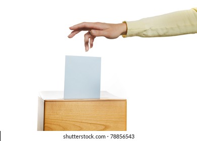 A Young Woman In An Election Shall Deliver Their Vote. Ballot At The Polling Station.