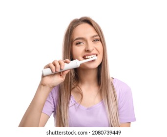 Young Woman With Electric Tooth Brush On White Background