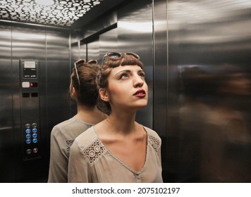 Young Woman In The Elevator