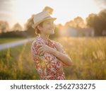 young woman embracing herself, self-love in action, mental health advocate, practicing self-care for finding inner peace, in European countryside